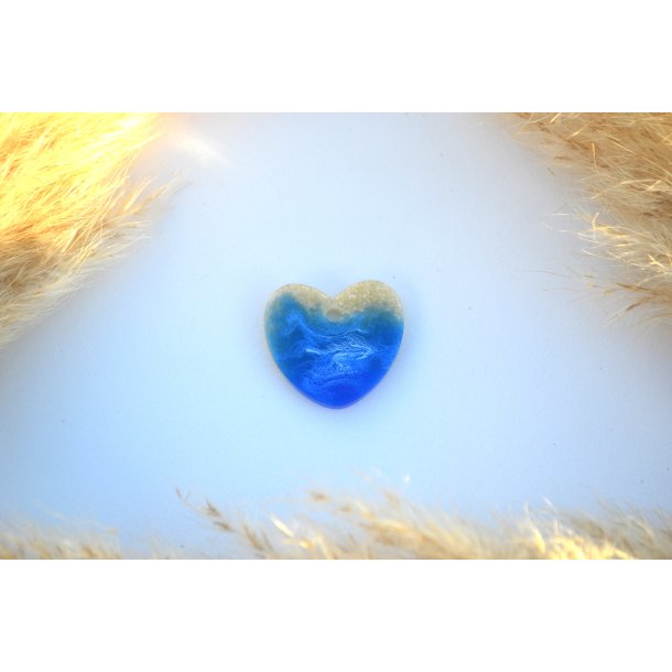 Hundetegn, stort hjerte, strand og hav