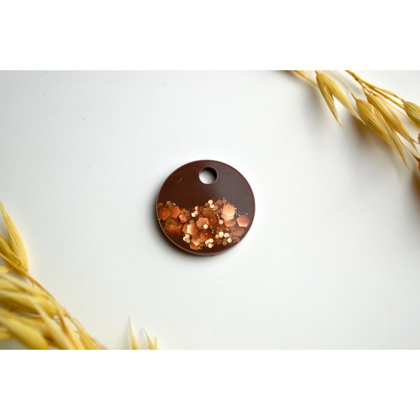 hundetegn, lille rund, brun med guld flager