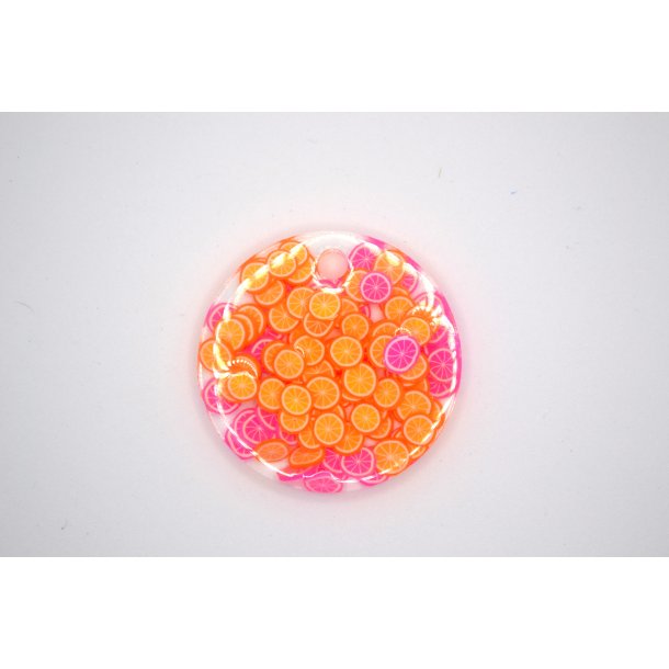 Hundetegn, stor rund, orange og pink appelsiner